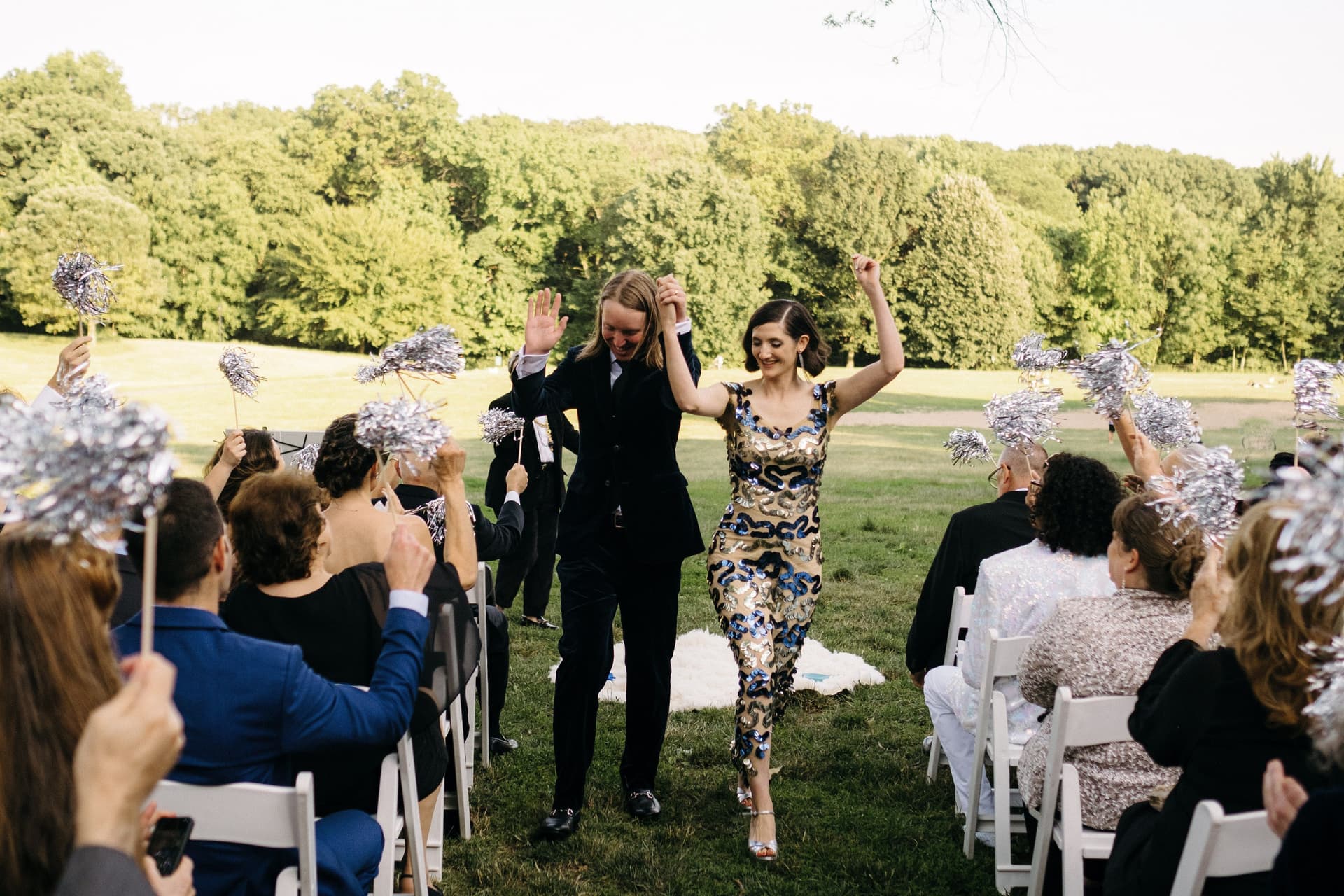 Couple celebrating with their wedding party